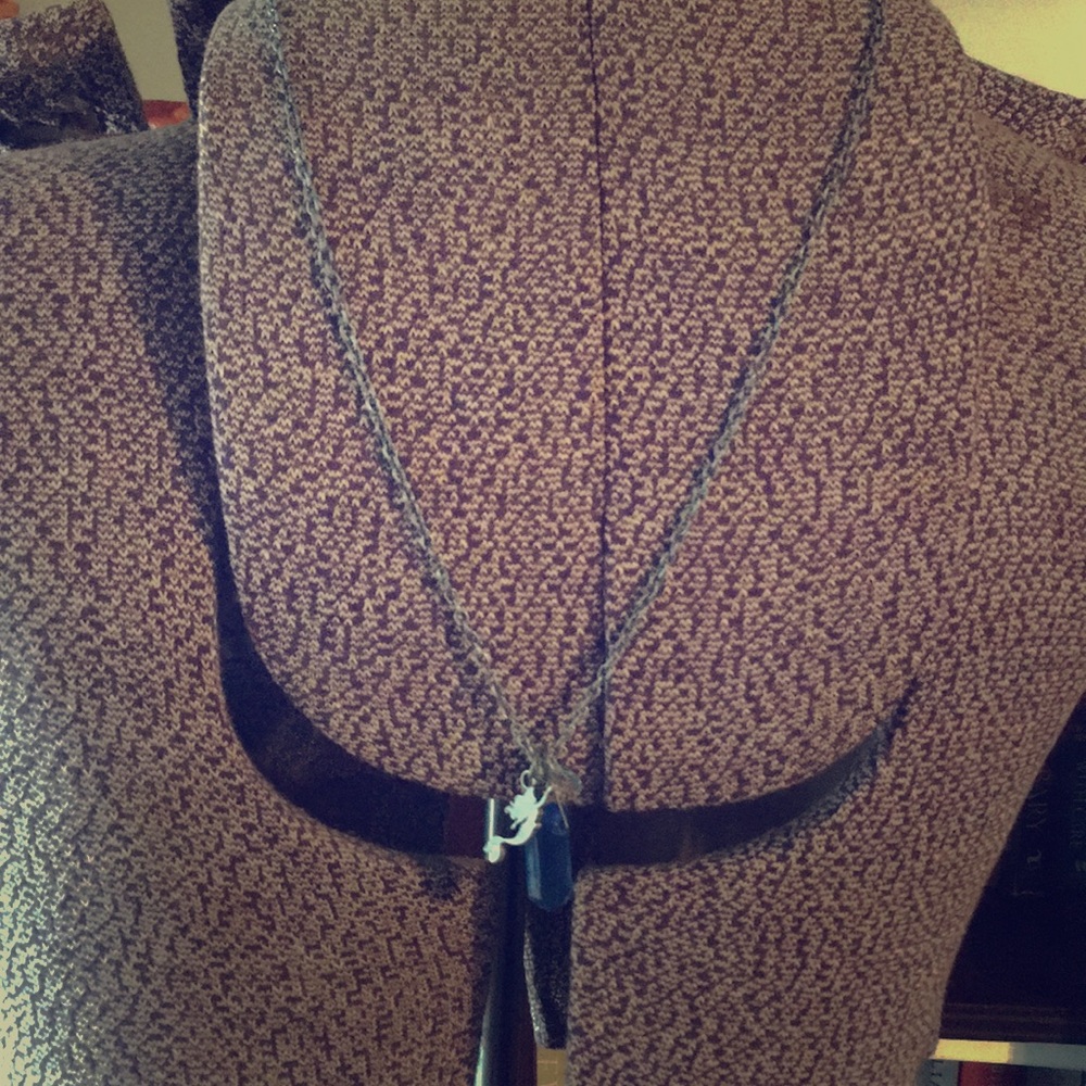 I am selling a Disney Ariel necklace.